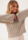 boat-neck-structure-knitted-sweater