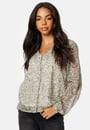 luna-l-s-v-neck-top-duffel-bag-aop-tanya