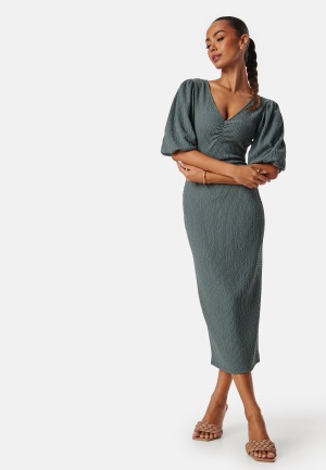 Läs mer om BUBBLEROOM Structure Puff Sleeve Dress Dusty green XS