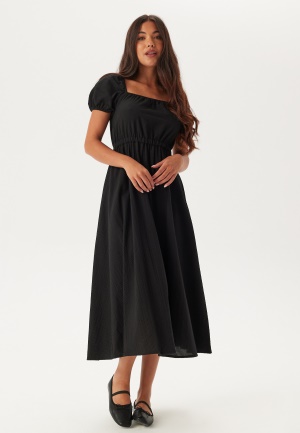 Läs mer om BUBBLEROOM Puff Sleeve Cotton Dress Black L