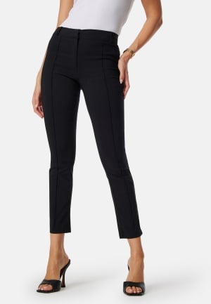 Läs mer om BUBBLEROOM Mid Waist Stretchy Trousers Black 46