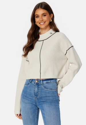 Läs mer om Calvin Klein Jeans Contrast Seaming Loose Sweater ACF Eggshell L