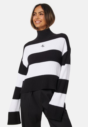 Läs mer om Calvin Klein Jeans Label Chunky Sweater 0GO CK Black/Whi Str XL