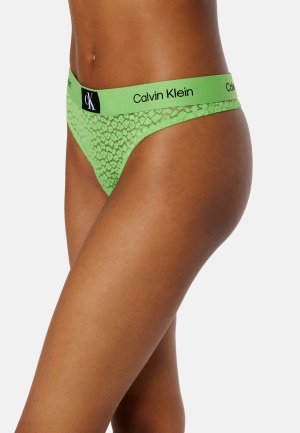 Läs mer om Calvin Klein Modern Thong AD1 Fabulous Green XS