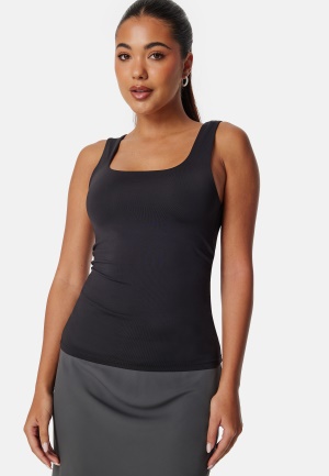 Läs mer om ONLY Onlea S/L 2-WAYS FIT TOP Black M