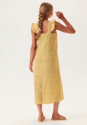 Läs mer om Pieces Pcflora Strap Flounce Dress Pale Banana Aop:small Flower L
