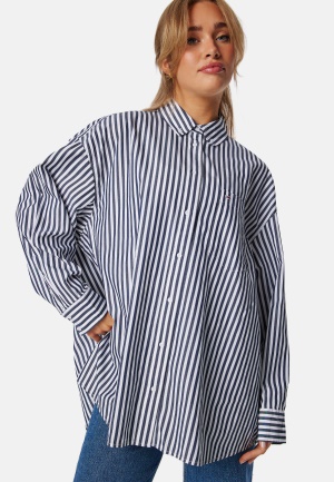 Läs mer om TOMMY JEANS Tjw Ovs Pinstripe Shirt C1g Dark Night Navy / STRIPEST L