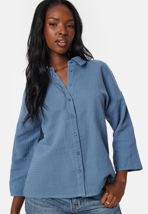 Läs mer om VILA Vilania button 3/4 shirt Cornflower blue 42